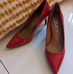 Red Calvin Pumps